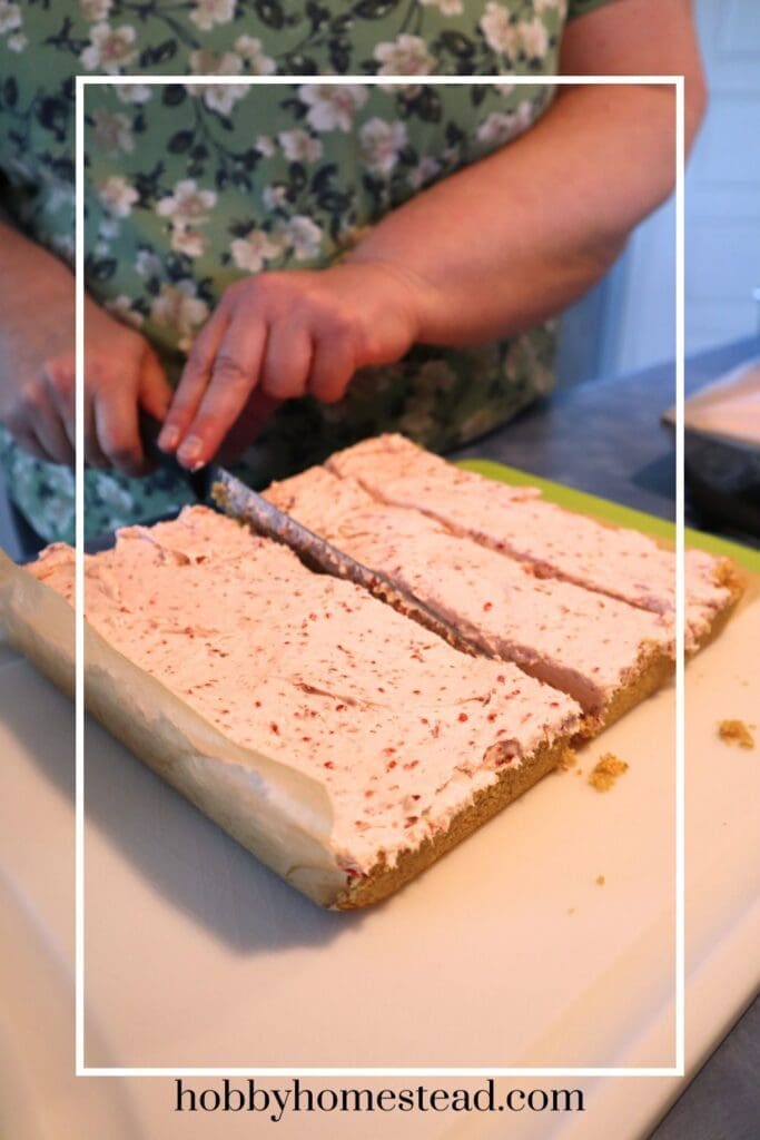 Cutting the Strawberry Bars into Squares
