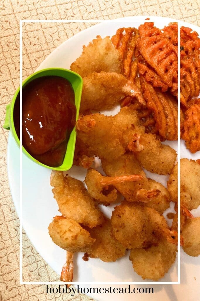 Shrimp and waffle fries with homemade shrimp sauce