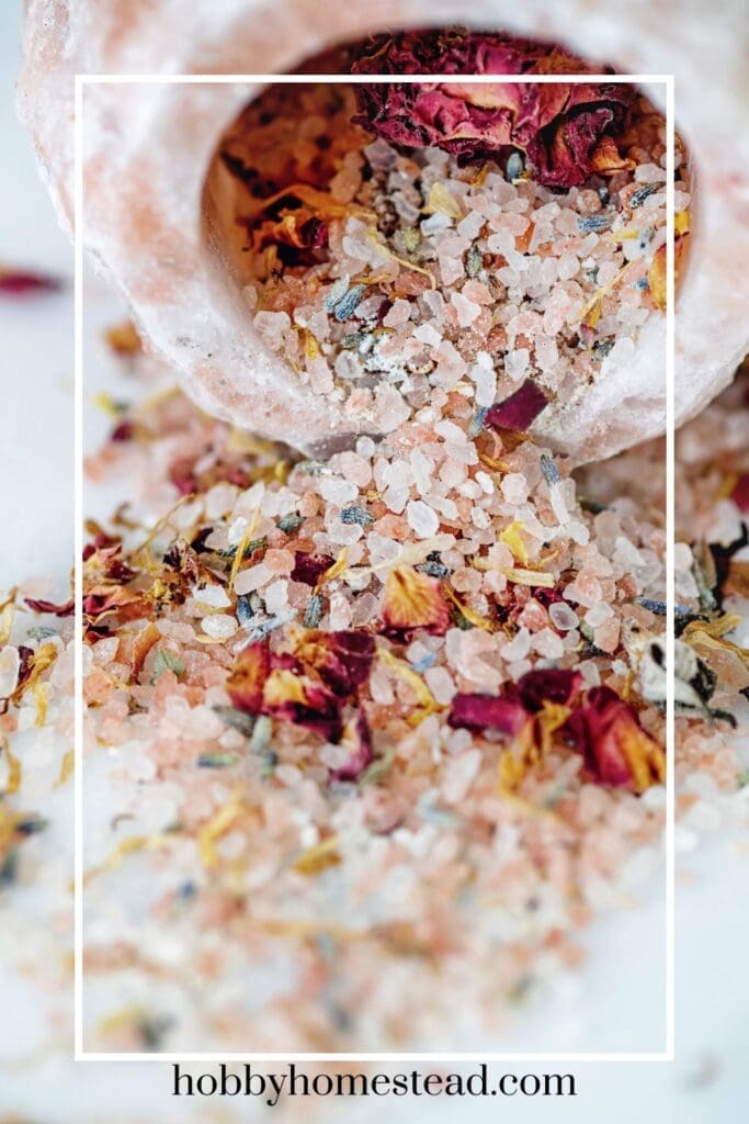 pouring our herbal bath salt mixture our of jar