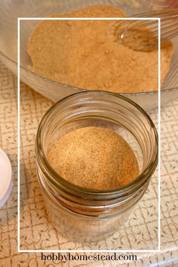 Filling Glass Jar with Taco Spice Blend