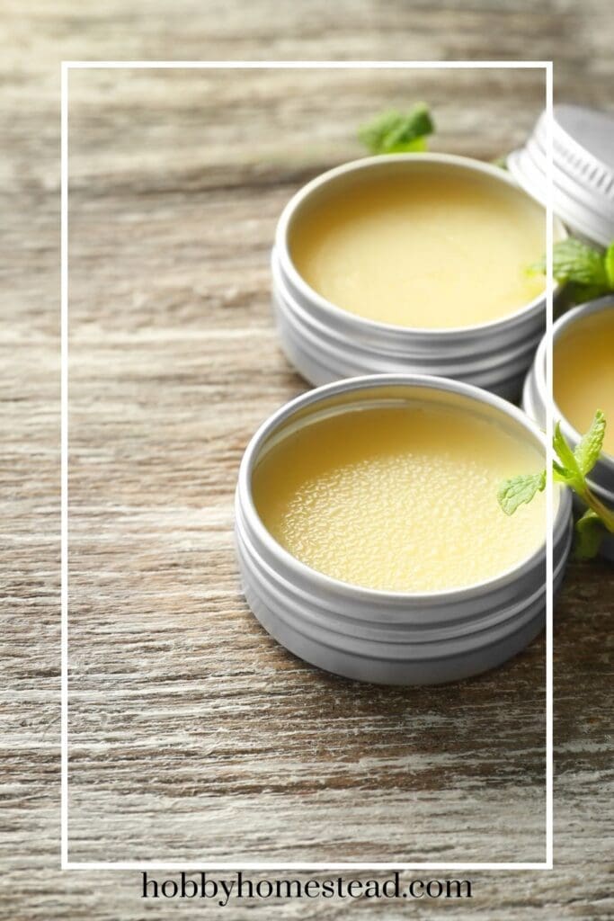 Tins of comfrey salve