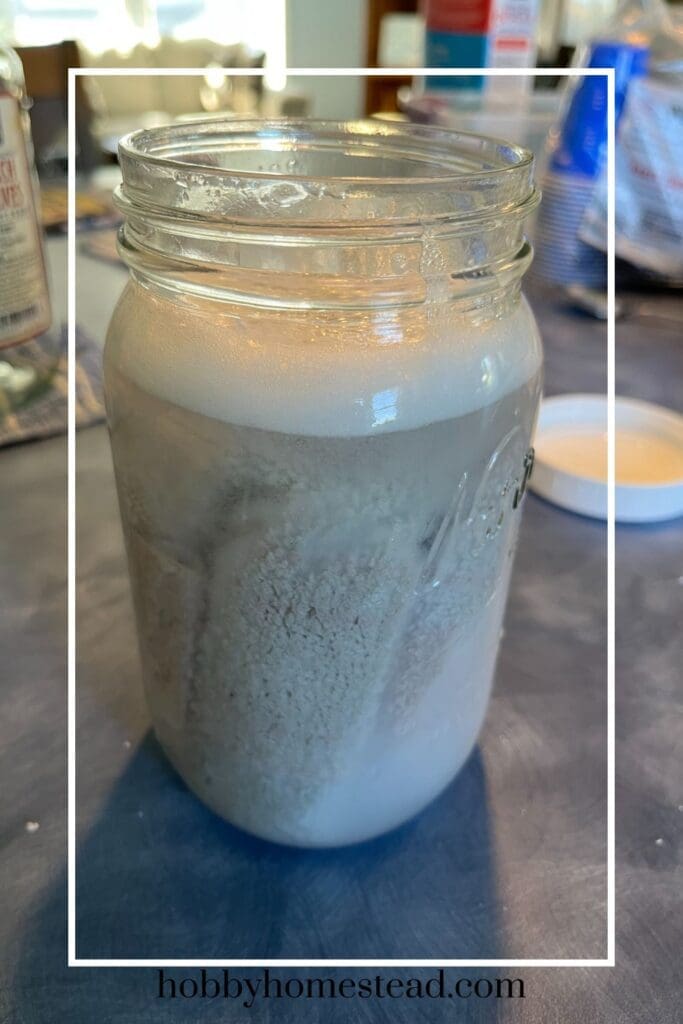 Jar of DIY Fabric Softener with Cut up Towels