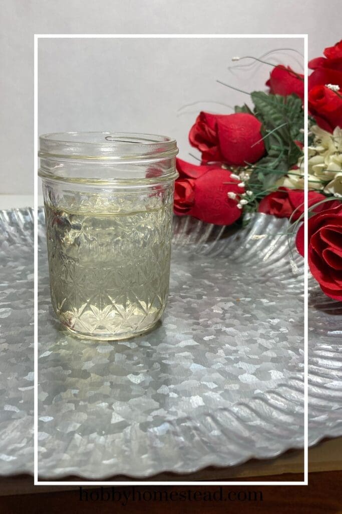 Jar of homemade sugar syrup in pint jar