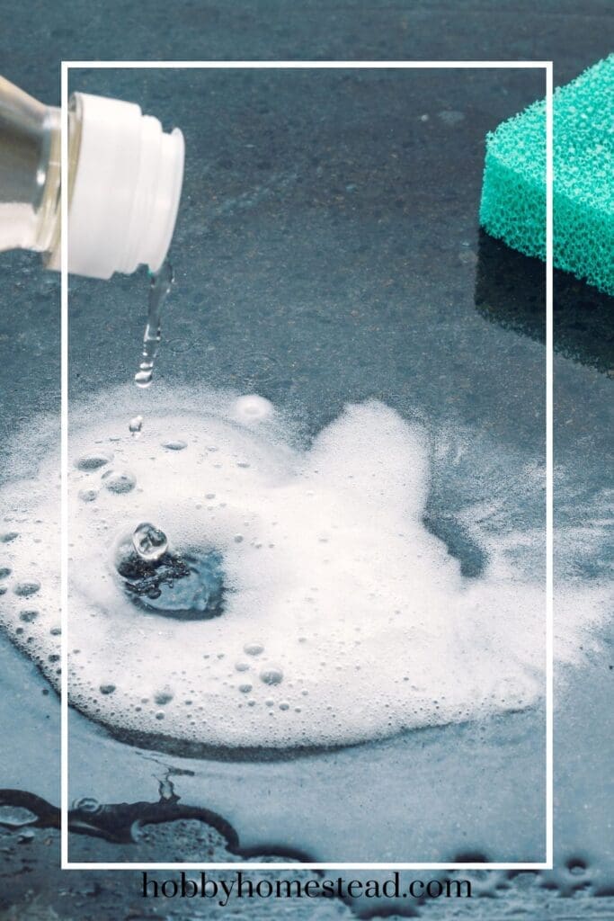 Adding vinegar to baking soda for cleaning