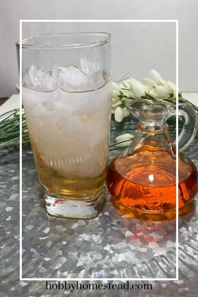 Adding peach syrup to ice water